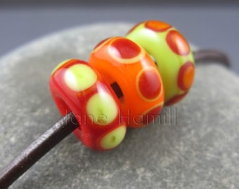 Glass charm beads, lampwork charm beads, lampwork glass beads, orange beads, red beads green beads, citrus beads, bhb, big hole beads, SRA