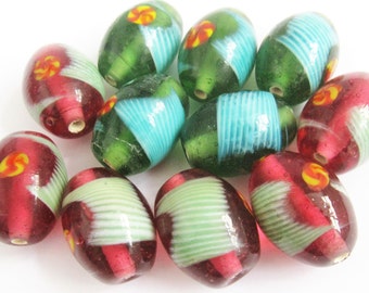 Loose beads. 12 Handmade lampwork glass beads. 20mm x 16mm.