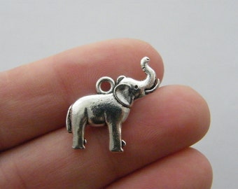 4 Elephant charms antique silver tone A1
