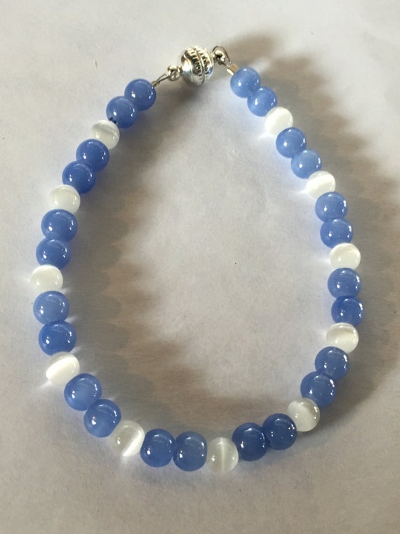 Items similar to Baby Blue and Cat's Eye Bracelet on Etsy