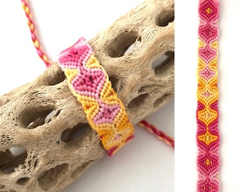 Friendship bracelet - sleeping tikis - tribal - embroidery floss - macrame - knotted - handmade - woven - pink - yellow - braided