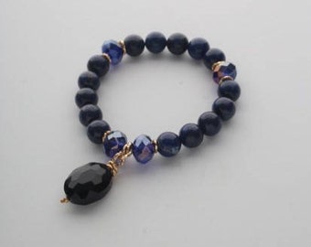 Bracelet with blue lapis lazuli and glass crystal. Natural stones 10mm