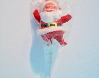 New Old Stock flocked santa floral or wreath picks. kitschy santa with fuzzy beard, on a wired stick.