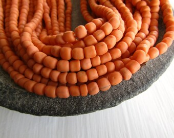 orange glass seed bead, matte barrel tube, small rustic ethnic spacer , indonesian 3 to 6mm, new indo-pacific (22 inches)7ab29-9