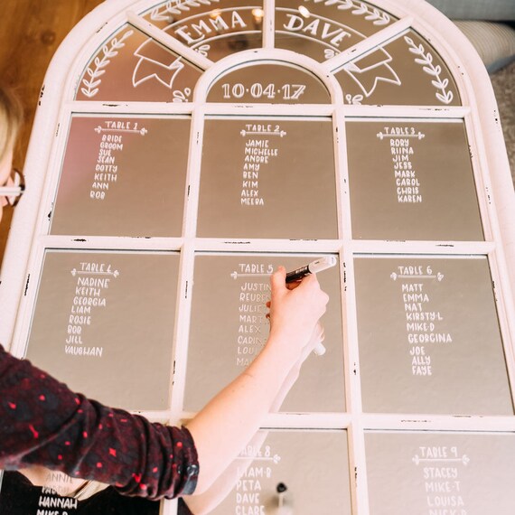 Custom Hand lettered mirror wedding table setting plan. Custom Hand lettered mirror wedding table setting plan.