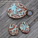 3 piece Pottery Bead Set, The Elli with a lace design in a worldly mix of colors 2 matching oval beads