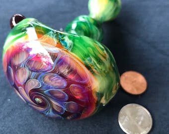 Heavy green spoon with amber honeycomb