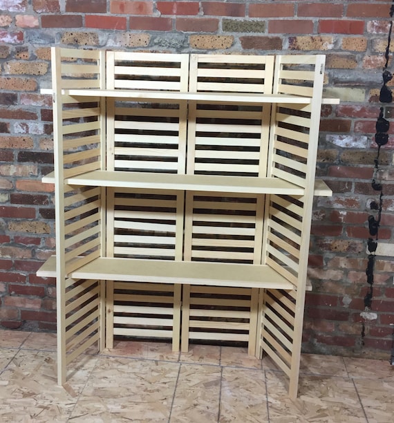 Portable Display Shelving Unit Four panel display unit with