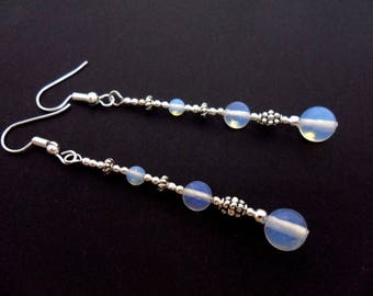 A pair of pretty opalite bead silver plated long dangly earrings.