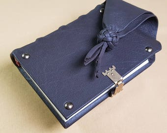 Girdle book-diary, 256 decorated pages, 15 cm x 11 cm.