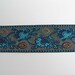 Woven Ribbon silver background with turquoise flowers, copper lurex - ref C4