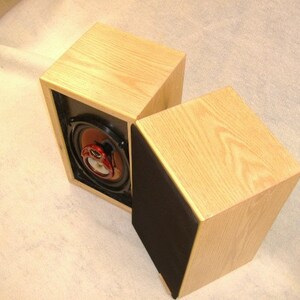 Compact three way speaker system