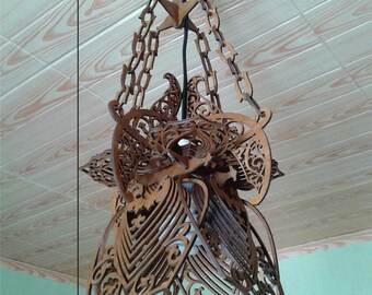 The original chandelier made of wood. Vector plan for manufacture on CNC