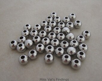 100 stainless steel beads 6mm round seamless