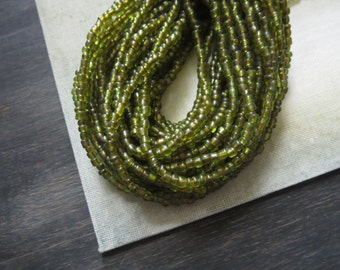 Green seed beads, green glass beads, small translucent olive organic barrel rondelle Indonesian 1.5 to 3.5mm / 44 inches strd - 3BBGL11-8