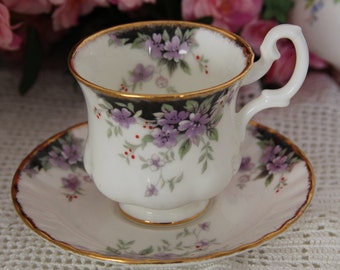 Royal Albert unnamed Teacup and Saucer Demitasse Teacup and Saucer Purple flowers on black and white porcelain
