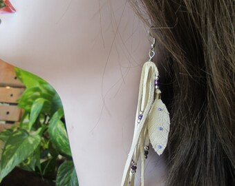 White Deerskin Leather Earrings With Silver And Purple Beads And Leather Feathers