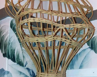 Vintage wicker female mannequin.