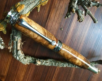 Rhodium and Black accent Majestic Junior Roller Ball with high gloss acrylic covered Oak Burl