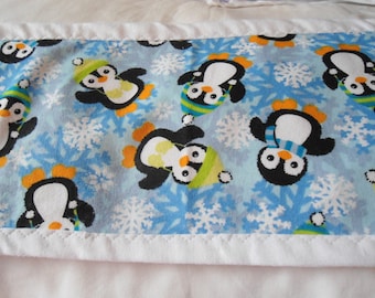 Burp Cloth with black and white Penquins on blue snow flake background