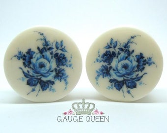 Delft Blue Rose Plugs. 4g /5mm, 2g /6.5mm, 0g /8mm, 00g /10mm, 1/2" /12.5mm, 9/16" /14mm, 5/8" /16mm, 3/4" /19mm, 7/8" /22mm, 1" /25mm