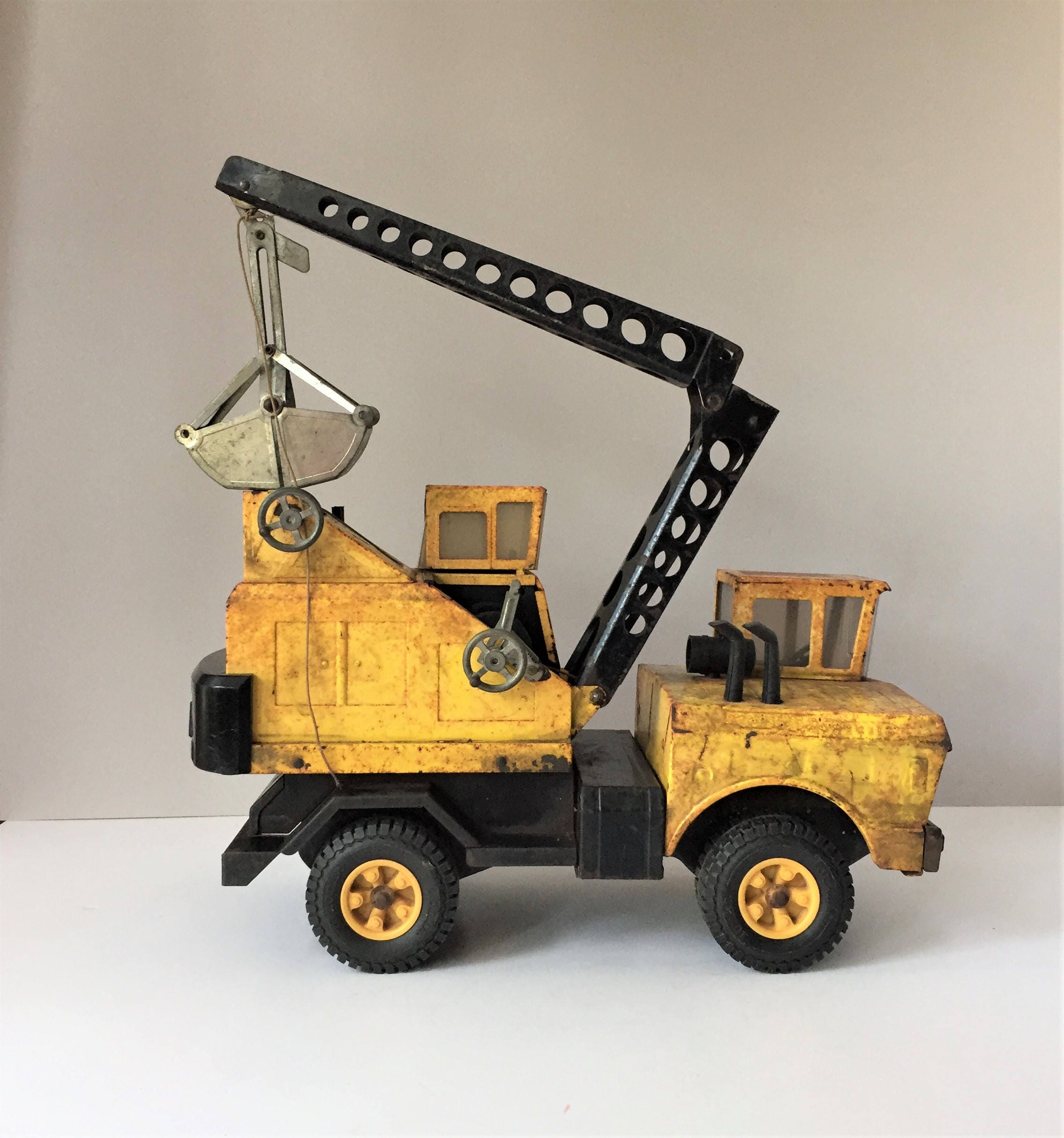 old toy crane