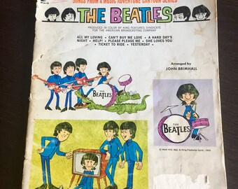 Vintage Beatles cartoon series song book by Hansen