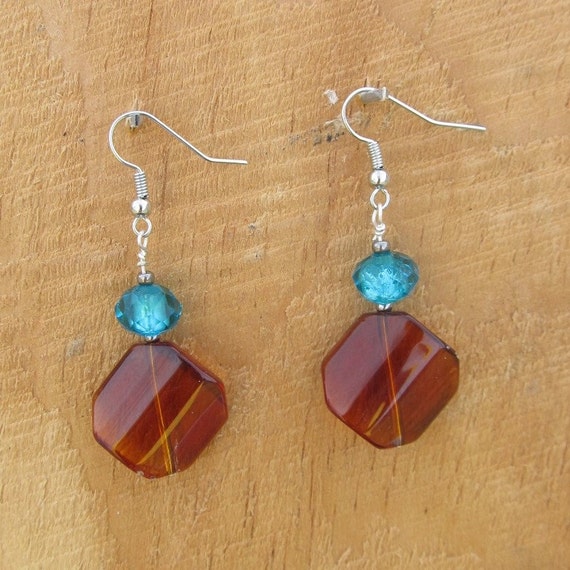 Items similar to Brown Glass Diamond bead with turquoise accent bead ...