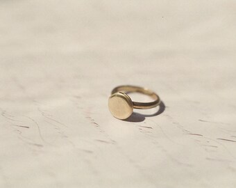 Tiny vintage locket ring in golden brass