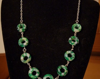 Green and white donut necklace
