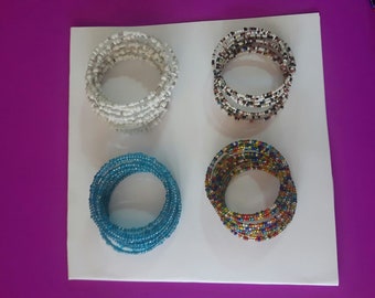 set of 4 beaded coil bracelet / african bracelet / coil bracelet / beaded bracelet