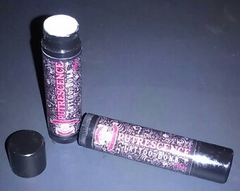 A .15 oz tube, Putrescence® Tattoo Bomb Balm - aftercare, ink, vegan, NTOA