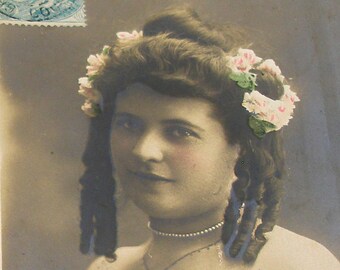 1904 French postcard, Actress with tight curls. RPPC real photo postcard, paper ephemera.
