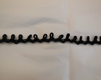 A black cotton Bridal sewing Corset Lacing elastic button loops in 1cm gap is for sale. Sold by per yard 90cm.