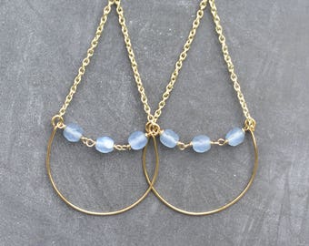 Keliani earrings // blue beads suspended between chain and wire