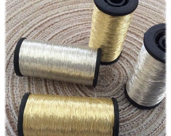 2 spools of Italian yarn type Skalli gold and silver