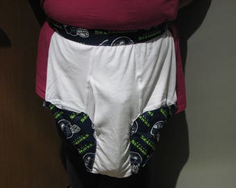 SEAHAWKS Tailgate Party, 4 pieces includes: an Apron with 3 pockets , a Pot holder, Hanging towel, and a Sock monkey. Great for gift giving