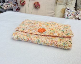 Peach clutch bag