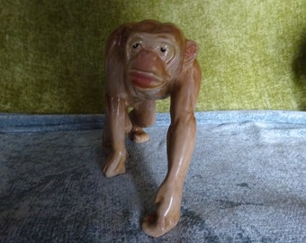 Pot Melba ware monkey in stride