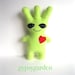 green alien plush toy