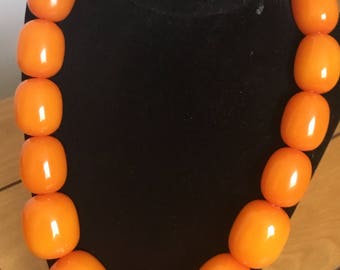 Bold orange statement necklace and bracelet set