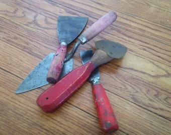 Four Red Handle Trowels Tools
