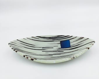 Elegant stripcut, fused glass bowl
