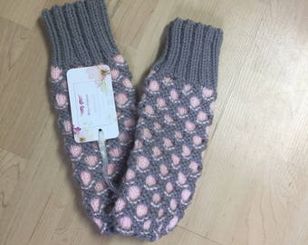Handmade knitted grey and pink mittens