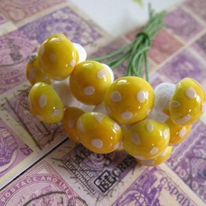 Germany Mushrooms 12 Little Yellow Spun Cotton Mushrooms 10mm