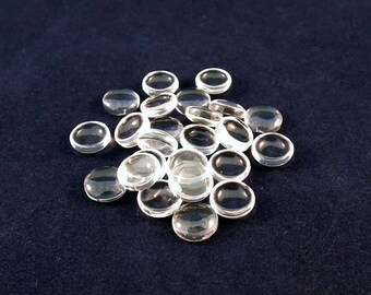 CAC19 - 8mm clear glass round Cabochons.