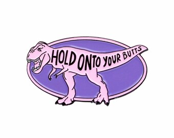 Hold onto your butts Jurassic Park dinosaur enamel lapel pin