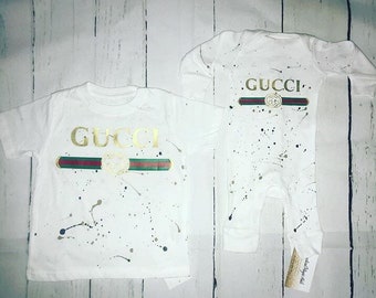 Deisgner inspired onesie/shirt