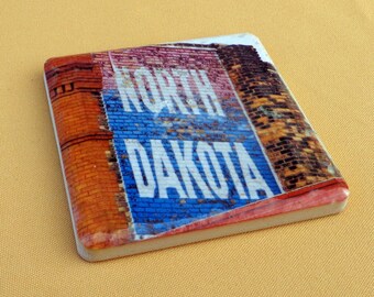 Coasters North Dakota painting on building