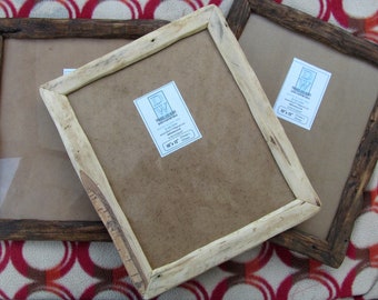 Rustic/driftwood style frames in locally sourced,recycled pine.Medium dark or clear beeswax finish.To fit 10"x12".Free U.K. shipping